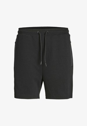 Shorts de sport noirs en tissu doux, avec une taille élastique à cordon de serrage et deux poches latérales zippées.