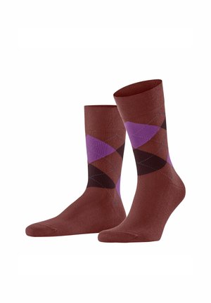 Pair of mid-calf socks in brown with purple and dark diamond argyle pattern, positioned upright on white background.