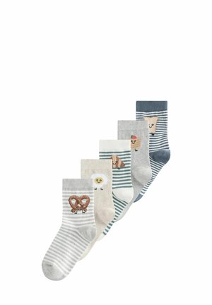 Fünf Paare Baumwollsocken mit verschiedenen Designs: Brezel, Ei, Hund, Eiscreme und gestreifte Muster in Grau, Weiß und Blau.