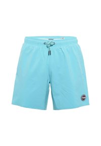 Pantaloni da bagno azzurri chiari realizzati in tessuto leggero. Presentano una vita elastica con cordino e una patch logo laterale.