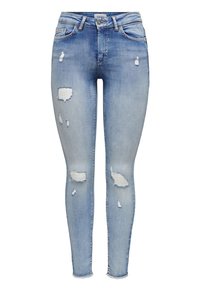 Jeans ajustados de color azul claro con parches desgastados en los muslos y las rodillas, estilo clásico de cinco bolsillos y dobladillos deshilachados.