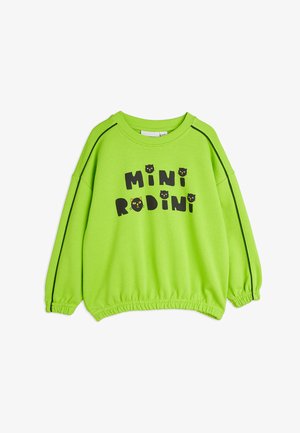 Zöld szövetséges pulóver kerek nyakkivágással, lecsúszott vállakkal, elasztikus alsó résszel, amelyen fekete "MINI RODINI" felirat és macska grafikák találhatóak.