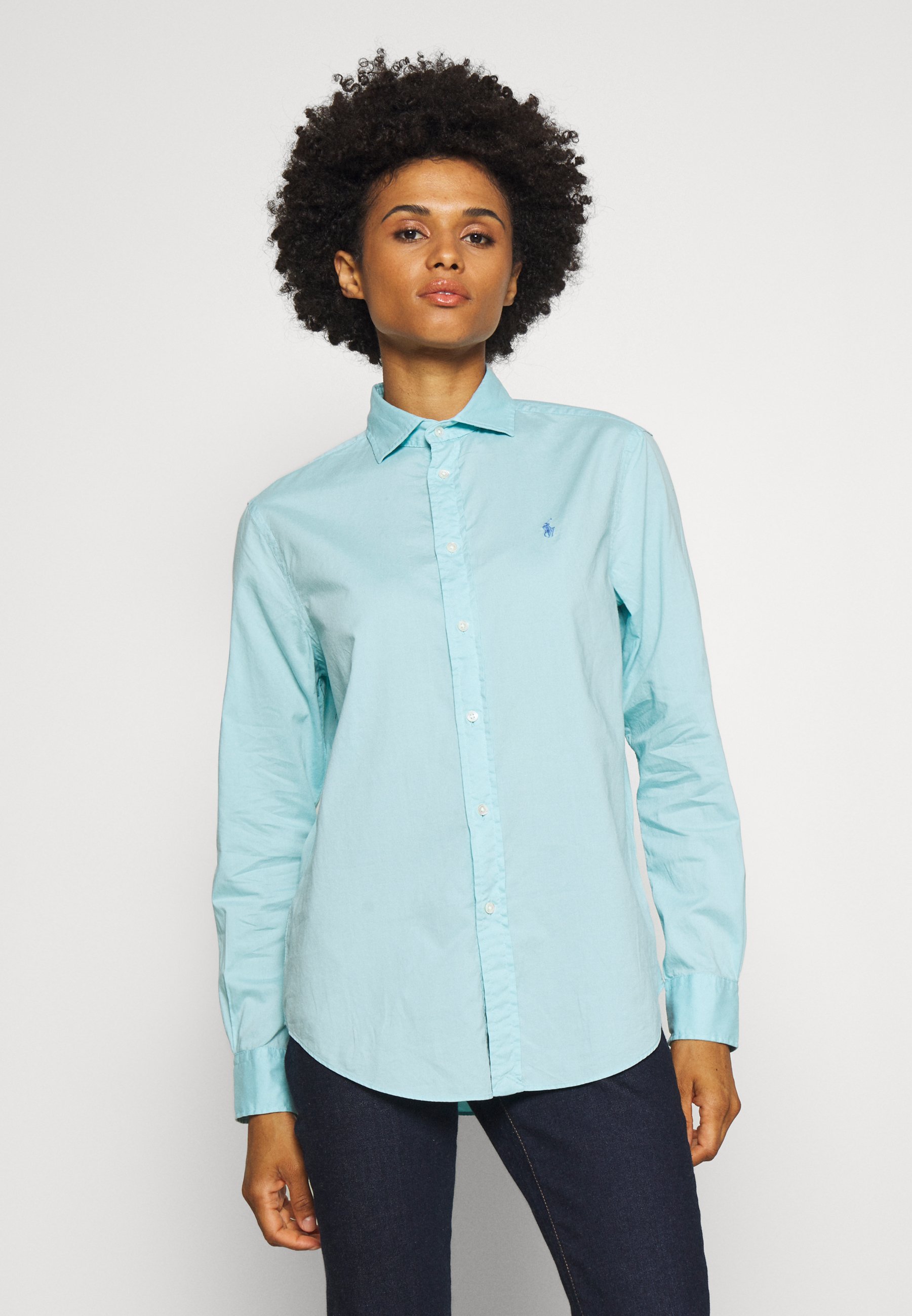 teal button down shirt