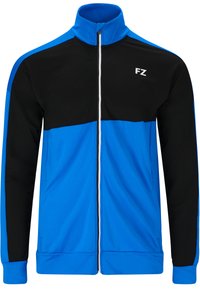 Blå och svart träningsjacka med hög krage, dragkedja och vita accenter. Har djärv färgblockering i ett slätt tyg.