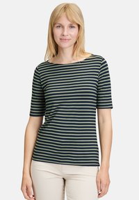 Pasiasty top z krótkim rękawem w ciemnoniebieskim i oliwkowym kolorze, wykonany z mieszanki bawełny, z szerokim dekoltem i miękką, gładką teksturą.