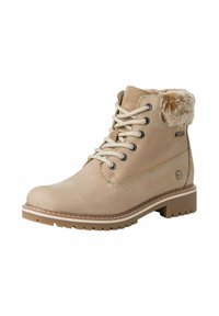 Beiga snörstövlar som når ankeln med en strukturerad mockafinish, fuskpälskrage, gummisula och kontrasterande sömnadsdetaljer.