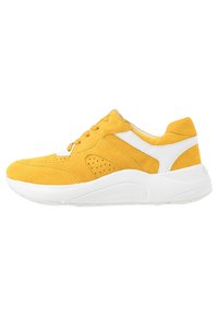Yellow suede sneaker with white accents and thick white sole, side view on a white background.