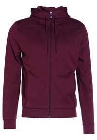 Sudadera con cremallera color burdeos, con un alto cuello, logo bordado, puños acanalados y detalles texturizados en los hombros. Fabricada en tejido suave.