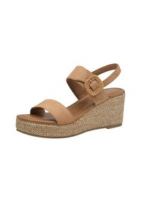 Sandale compensée avec une tige en daim beige, large sangle avant, sangle de cheville ajustable et une plateforme texturée en jute tissé.