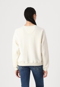 American Eagle Sportska majica - cream