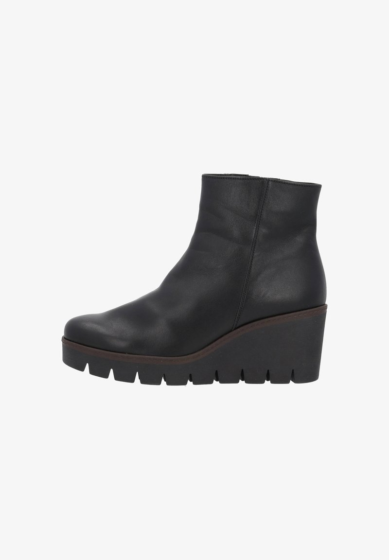 Black leather ankle boots with a smooth texture, featuring a wedge heel and a thick, ridged sole. Simple design with minimal accents.