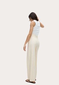 Marks & Spencer Kalhoty - yellow mix