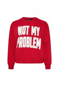 Maglione corto rosso con maniche lunghe e la scritta "NON È UN MIO PROBLEMA" stampata in grandi lettere bianche sul davanti. Tessuto morbido.