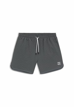 Pantaloni da bagno grigi a quadri con cintura regolabile e logo bianco, caratterizzati da una texture morbida e orlo curvo.