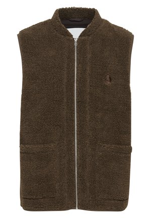 Brūns vilnas veste ar augstu apkakli, priekšējo rāvējslēdzēju un divām sānu kabatām. Struktūrēts materiāls ar mīkstu, pūkainu apdari.