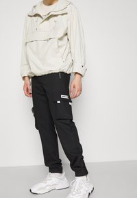 Pegador Cargobyxor - black
