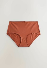 Culotte taille haute couleur rouille avec un petit nœud au centre de la ceinture sur un fond uni.