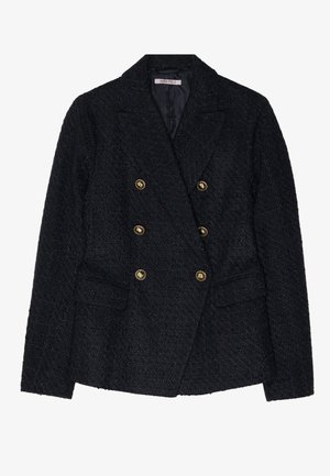 Blazer noir à double boutonnage avec un tissu texturé, comportant deux poches avant et des accents de boutons dorés.