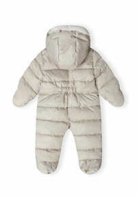 Combinaison d'hiver pour bébé rembourrée en beige clair avec des motifs géométriques blancs, une capuche, une taille élastique et des poignets côtelés pour la chaleur et le confort.