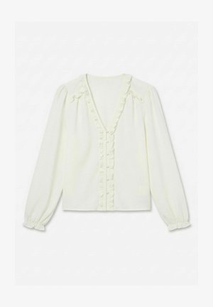 Biela blúzka s dlhými rukávmi, výstrihom do V, prednými gombíkmi potiahnutými látkou a volánikmi pozdĺž výstrihu a manžiet.