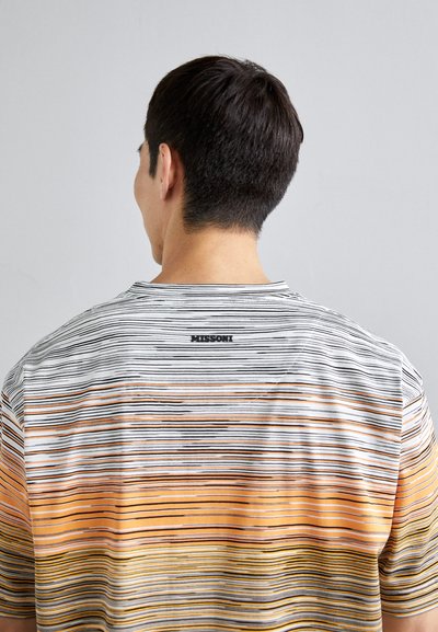 Multicolor striped T-shirt with a round neck, featuring horizontal lines in white, orange, and yellow. Back displays "MISSONI" logo.