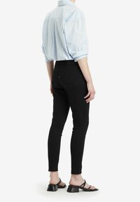 Levi's® Vaqueros pitillo - mottled black