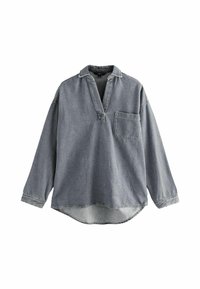 Denim-Tunika mit tiefem V-Ausschnitt, langen Ärmeln, einer Brusttasche und abgerundetem Saum. Die Farbe ist hellblau-grau mit sichtbaren Nähten.