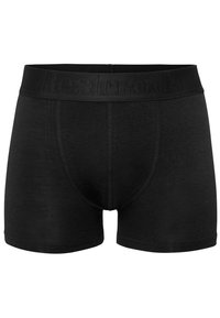 Sorte bomuldsboksershorts med en tekstureret taljeelastik, der har brandnavnet. Stoffet er glat og giver en tætsiddende pasform uden synlige mønstre.