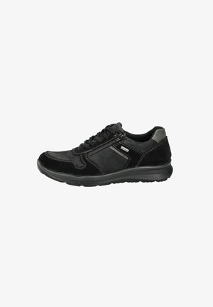 Black sneaker made of suede and synthetic materials, featuring a rounded toe, contrasting stitching, and a textured rubber sole.