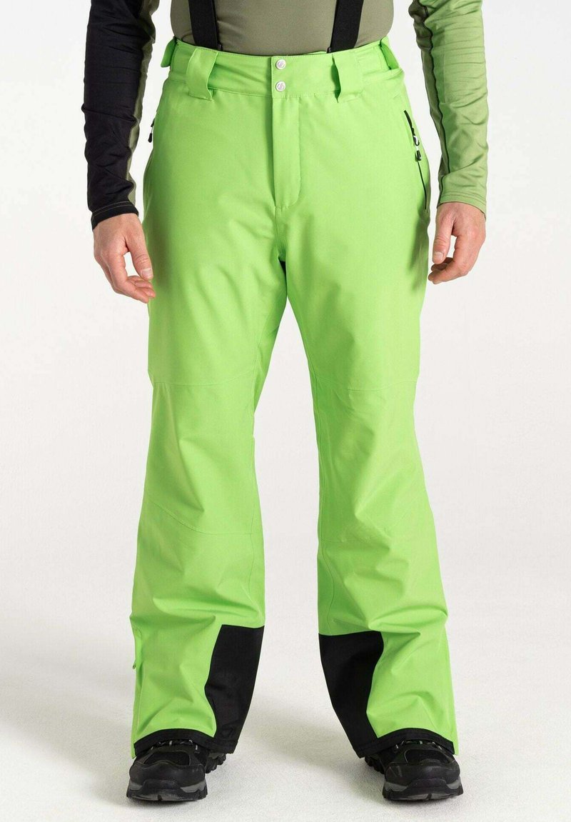 Helle grüne Skihosen mit schwarzen unteren Säumen, ausgestattet mit verstellbaren Trägern, Vorderknöpfen und seitlichen Reißverschlusstaschen. Wasserdichtes Material.