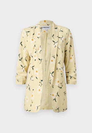 Blazer amarillo claro con estampado floral de margaritas blancas, mangas largas con puños y diseño frontal abierto.