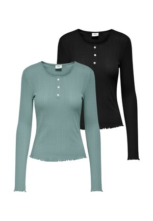 Deux tops à manches longues : l'un en teal avec une texture côtelée et trois boutons, et l'autre en noir, également côtelé, avec un ourlet droit.