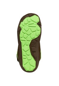 Bruine schoenzool met een gestructureerd groen rubberen loopvlak met een bladvormig patroon en een ronde vorm. Opvallende grip voor gebruik buitenshuis.