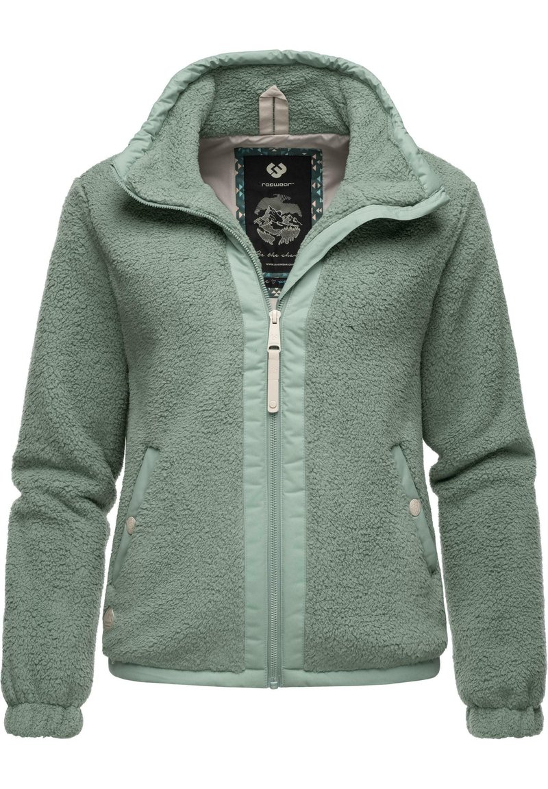 Green fleece jacket with a zip front, high collar, side pockets, and textured fabric. Features contrasting smooth panels and accent buttons.
