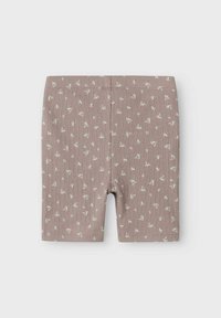 Ljust bruna, ruggade shorts med ett blommönster i vitt och grönt. Har en elastisk midja. Lämpliga för avslappnad användning.