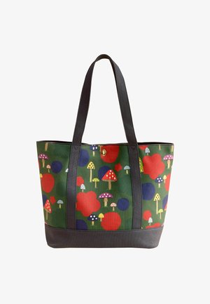 Zelená taška s černými popruhy, zdobená barevnými houbovými a kruhovými vzory v červené, modré a žluté barvě na texturované tkanině.