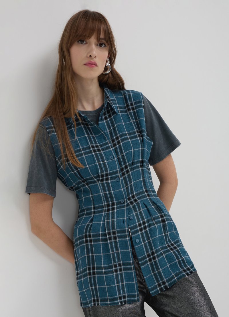 Calliope SANS MANCHES À CARREAUX - Camicia - une variante