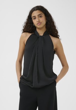 Black halter top with draped front, made from lightweight fabric. Features a tied neckline and minimalistic design, suitable for layered outfits.