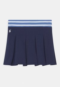 Laivansiniset laskostetut hameet, joissa on ribattu vyötärö, jossa on vaaleansinisiä raitoja ja valkoinen logo vasemmalla edessä. Valmistettu pehmeästä kankaasta.