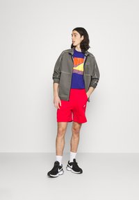 Nike Sportswear WASH REVIVAL - Treniņjaka - black
