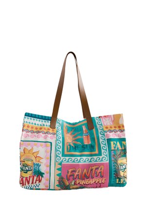 Colorful tote bag with brown straps featuring vintage Fanta soda advertisements and tropical-themed designs.