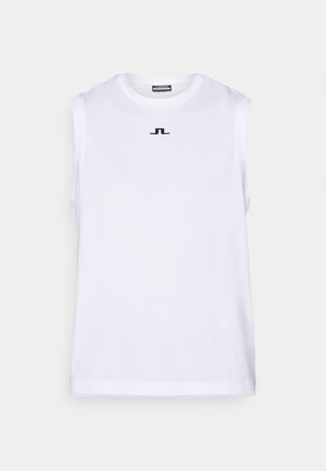 Hvit ermeløs topp laget av glatt stoff, med en rund halslinning og en liten svart logo i midten. Designet er enkelt og rent.