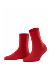 Calzini crew rossi in cotone con un colore uniforme, texture liscia e bordo a coste. Il design è semplice e funzionale.