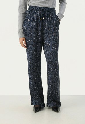 Marineblauwe broek met luipaardprint, gemaakt van een soepel materiaal, voorzien van een elastische tailleband, zijzakken en een comfortabele, losse pasvorm.