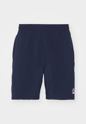 Shorts de sport bleu marine en tissu respirant avec une taille élastique et un petit badge logo en bas à gauche.