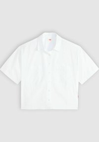 Short-sleeve white button-up shirt with a collar, two chest pockets, and a straight hem. Made from lightweight cotton fabric. Red tag detail.