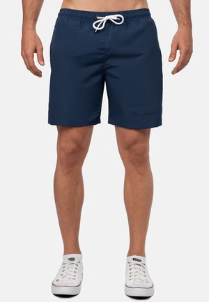 Marine zwemshorts met elastische tailleband en trekkoord. Gemaakt van lichtgewicht stof, met een logoaccent en een relaxed fit.