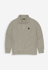 Hellbeige Sweatshirt mit einem Viertel-Reißverschluss am Hals, seitlichen Taschen und einem kleinen schwarzen Logopatch auf der Brust. Weicher Stoff mit glatter Textur.