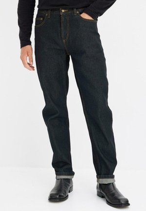 MIT SEITLICHEM DEHNBUND - Jeans a sigaretta - black