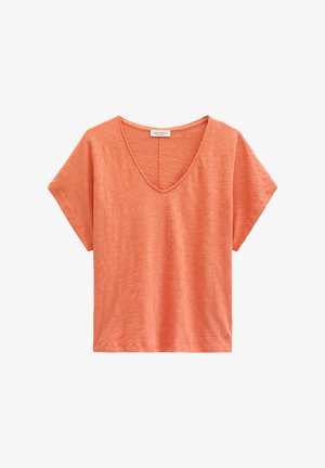 T-shirt met korte mouwen, losse pasvorm, koraaloranje met V-hals, subtiele textuur en klein logo op de onderzoom.